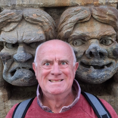 Mike between two grotesques